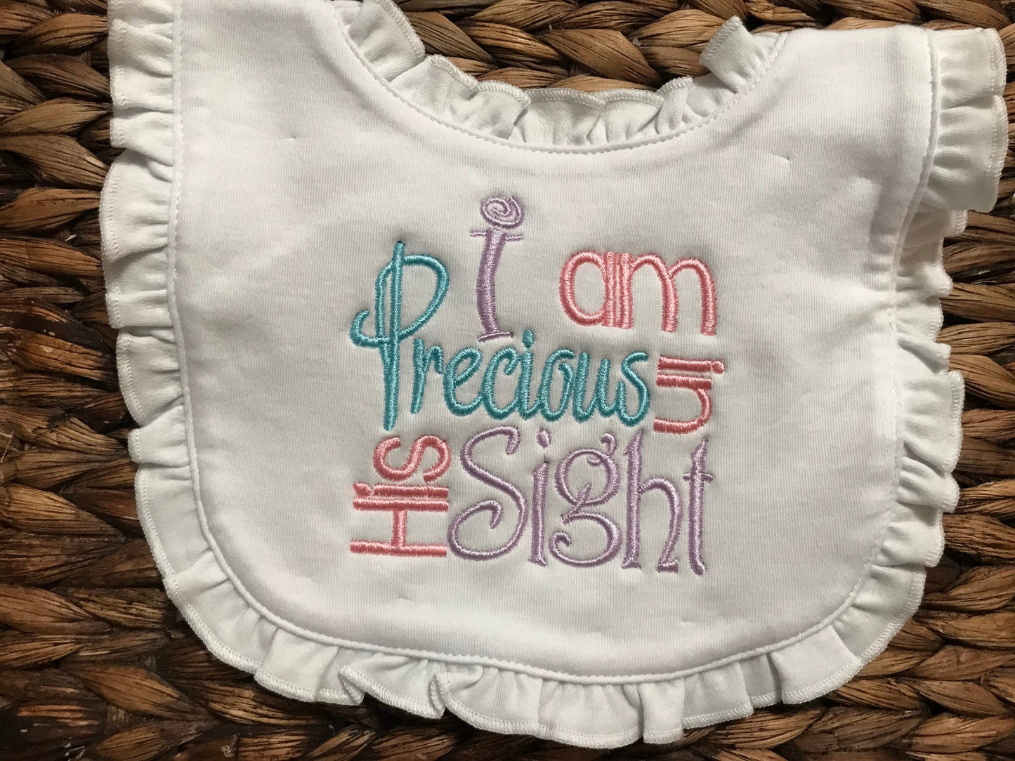 Embroidered Ruffle Baby Bib: "I Am Precious In His Sight"