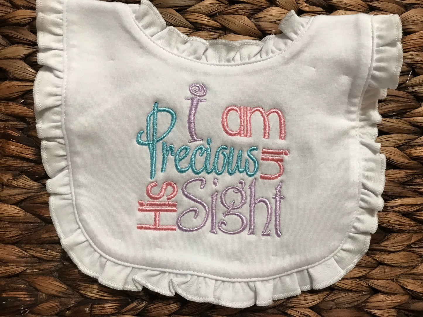 Embroidered Ruffle Baby Bib: "I Am Precious In His Sight"